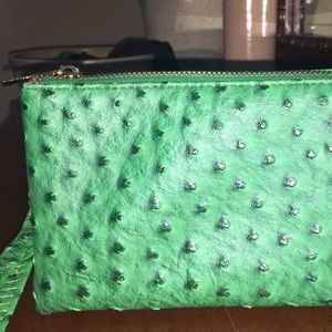 Crossbody or wristlet in green ostrich